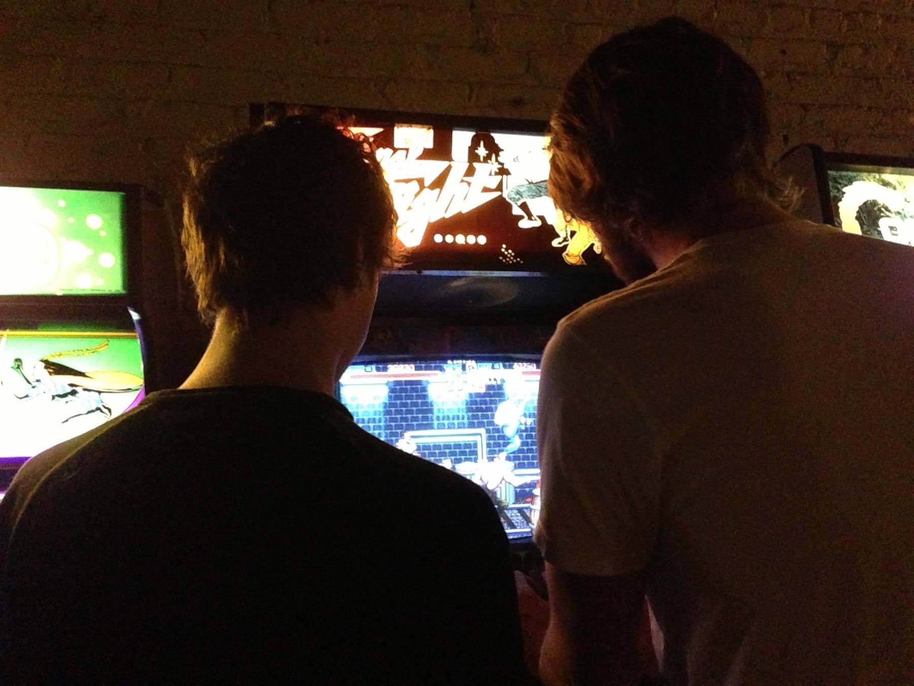 Richard and Butcher play an arcade game
