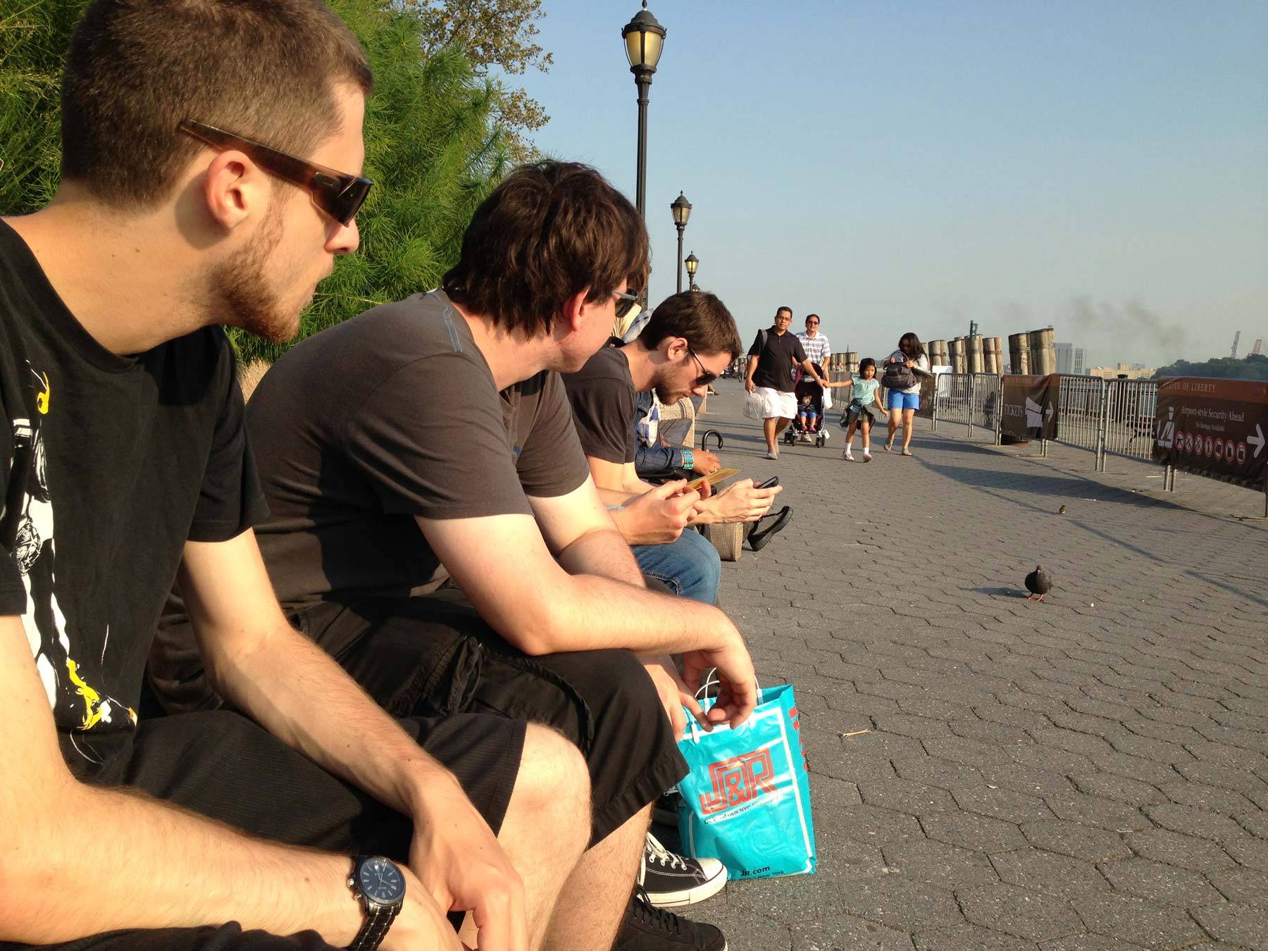 Irwin, Andrew, Butcher, and Jared sitting at the bay
