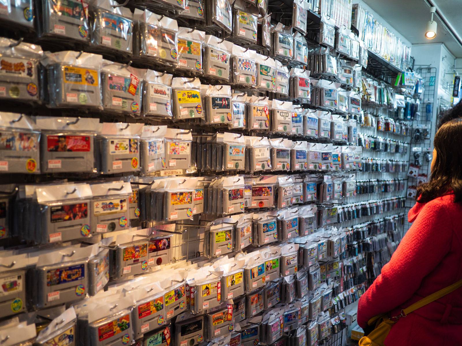 A wall of secondhand Super Nintendo cartridges
