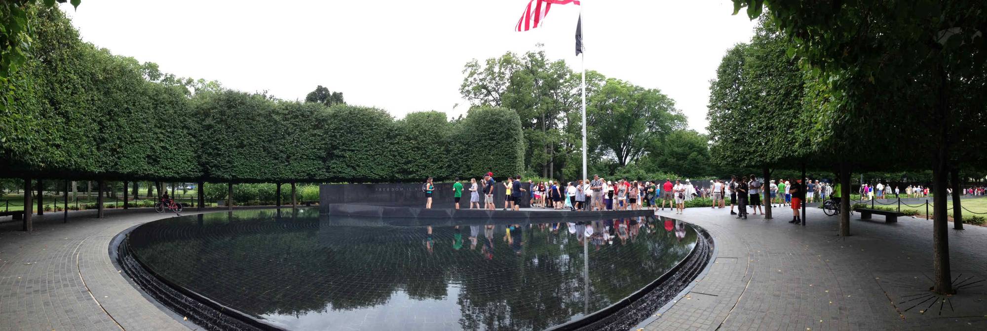 A third panorama of Korean War Veterans Memorial with visitors