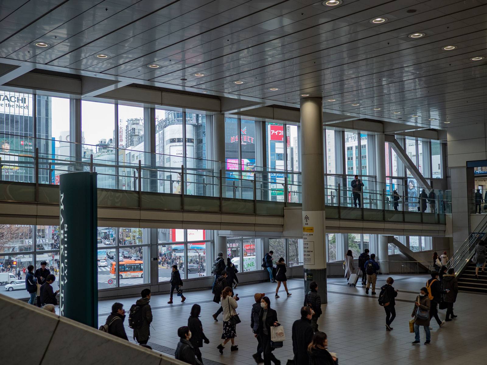 Passengers walking through Shibuya station