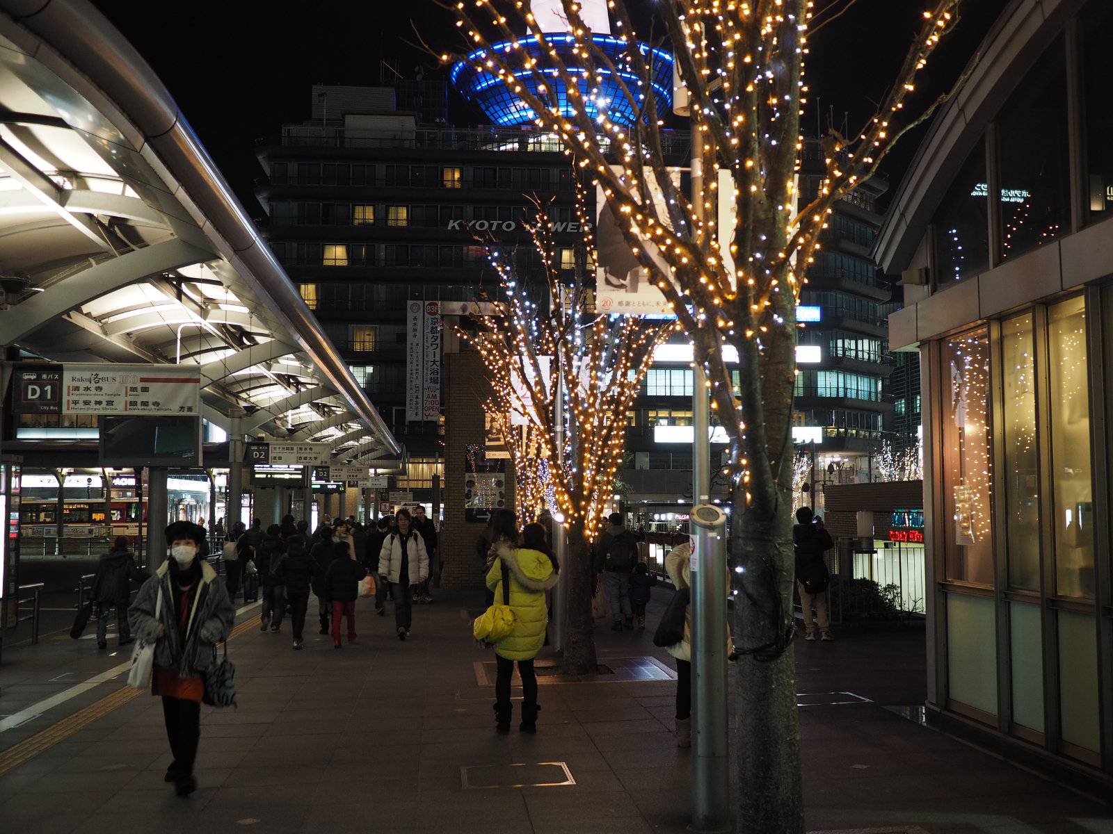 Trees covered in fairy lights near the station