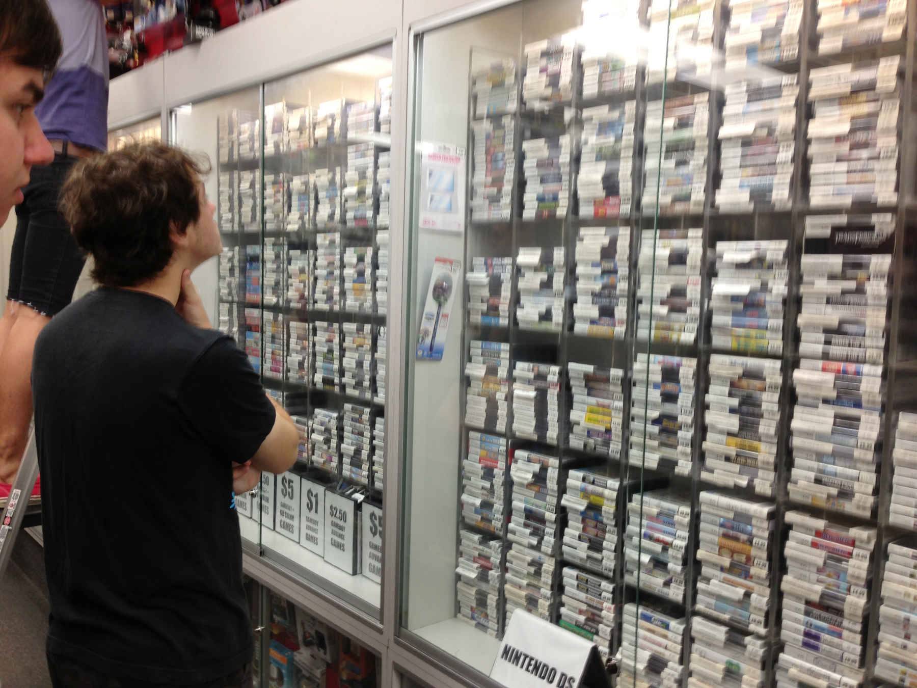 Richard scanning the secondhand videogames