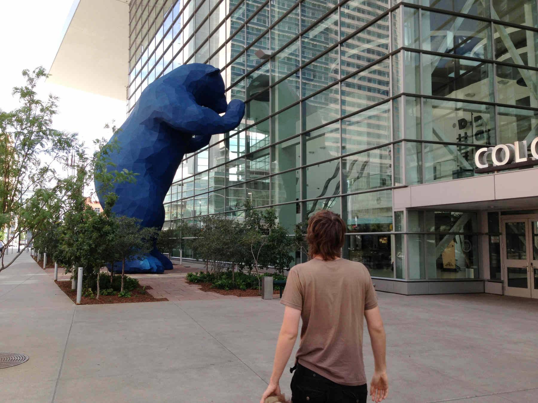 Butcher approaching the blue bear statue
