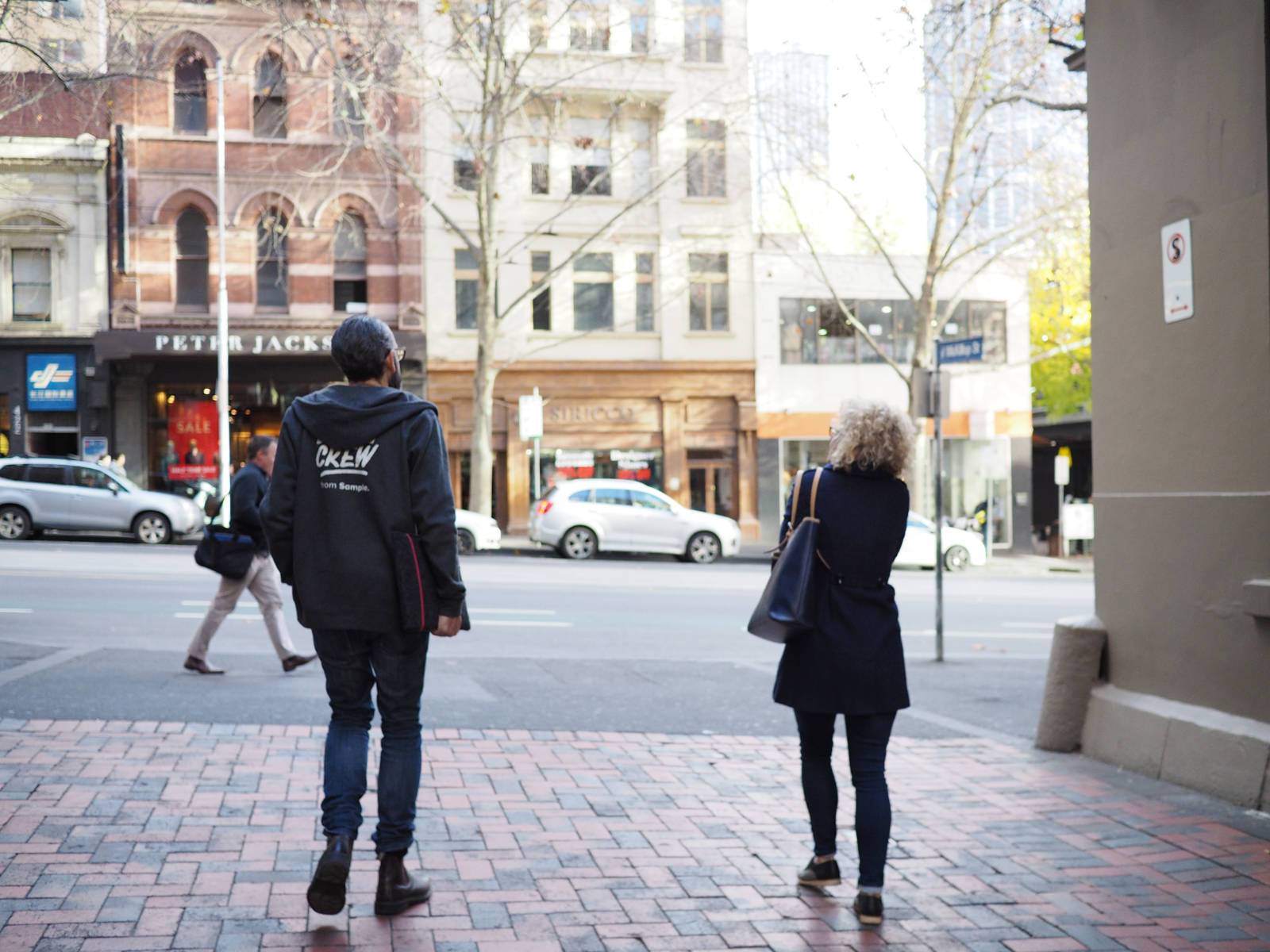 Simon and Anna walking through Melbourne CBD