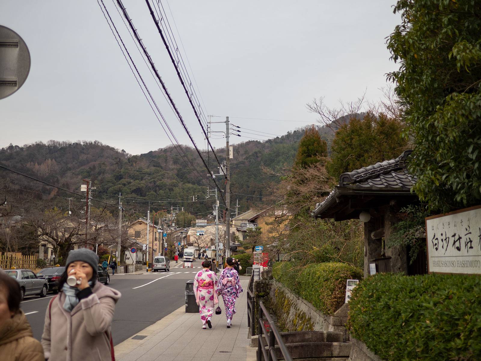 Women dressed ion Kimona walking East towards Higashiyama Jisho-ji
